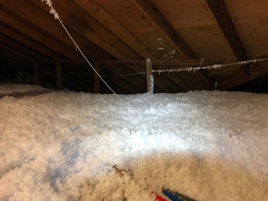 attic insulation upgrade with blown insulation improving energy efficiency texas home